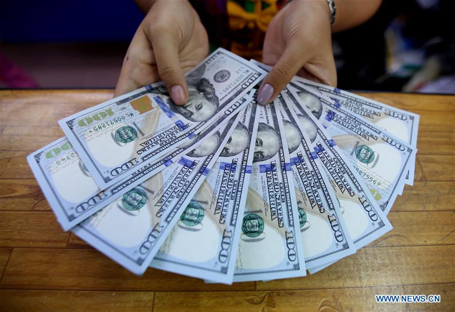 MYANMAR-YANGON-FOREIGN CURRENCY EXCHANGE-RAISING