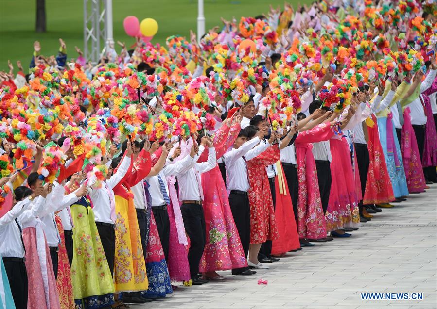 DPRK-PYONGYANG-XI JINPING-PEOPLE-WELCOME