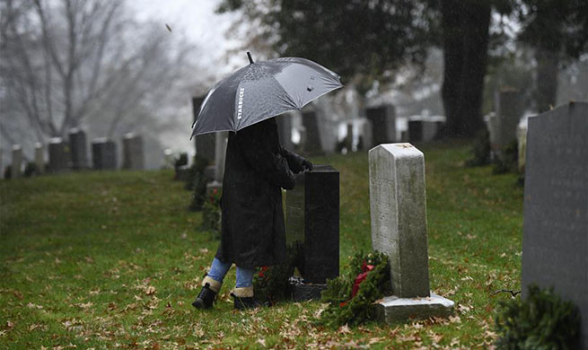 Wreaths Across America Day marked at Arlington National Cemetery in Virginia, U.S.