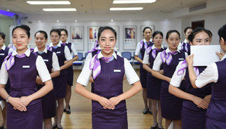 Crew members of bullet trains in E China prepare for G20 Summit